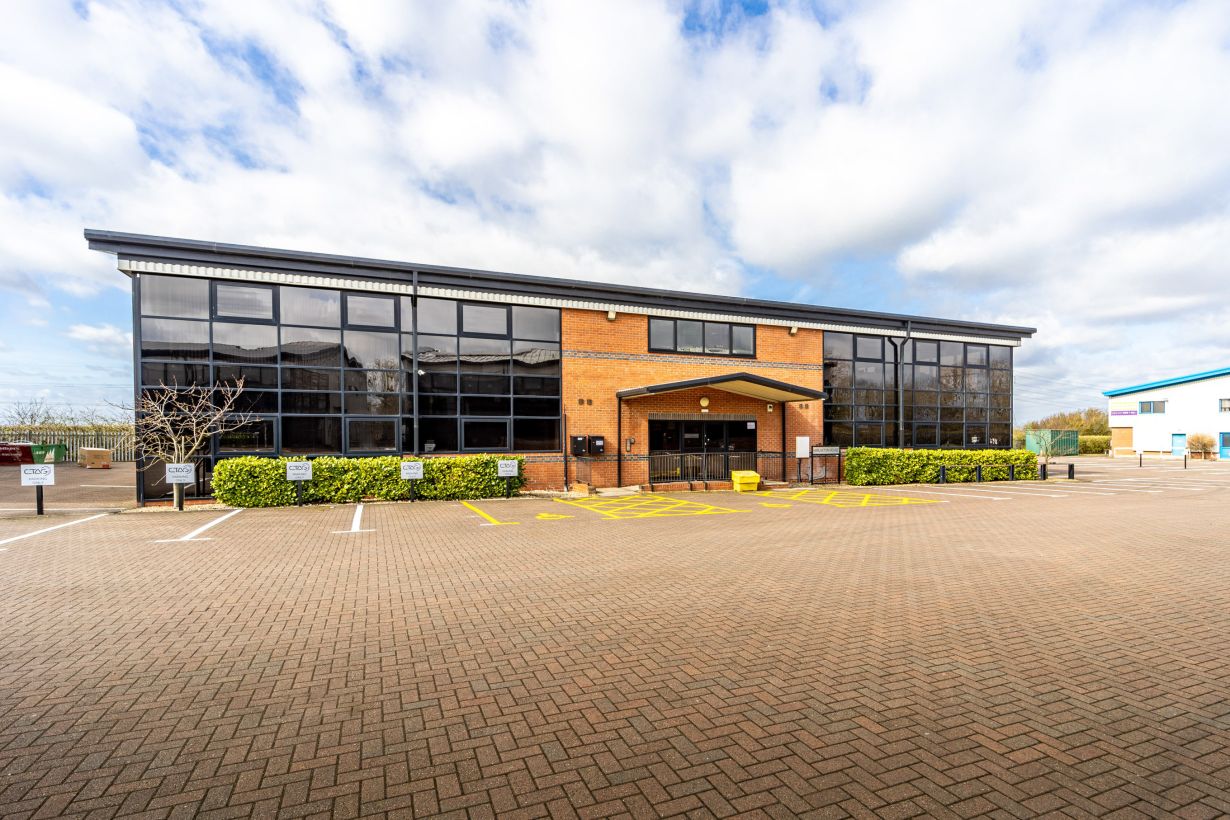 Stylish and contemporary office lounge in Harlaxton House with vibrant decor, natural light, and comfortable seating, designed to foster creativity and collaboration among professionals in the East Midlands.